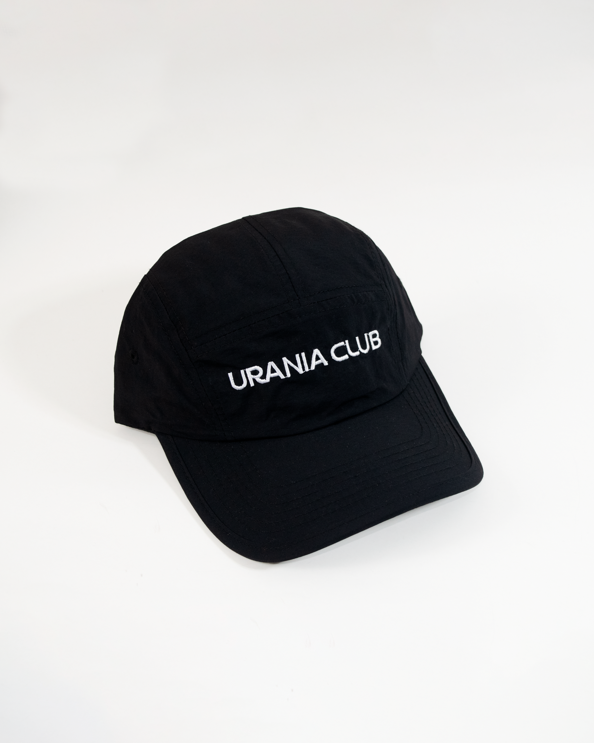 Gorra impermeable de 5 paneles con visera curva, fabricada en 100% nylon