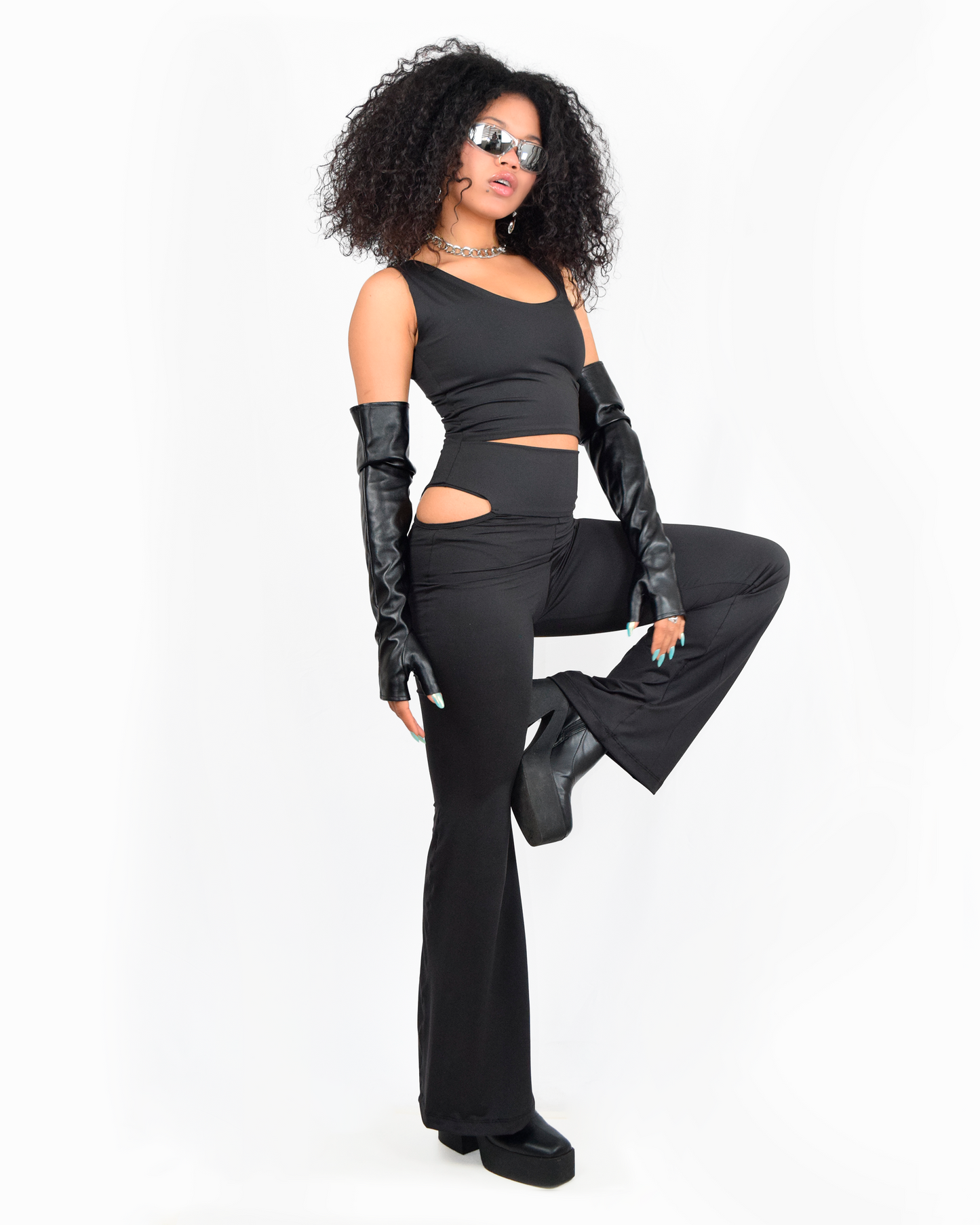 Calzas flare negras de tela suplex con corte lateral – Urania Club