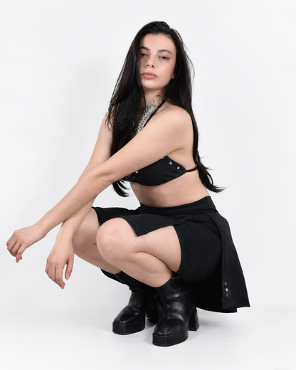 Falda negra con tablas y short interior integrado - Urania Club