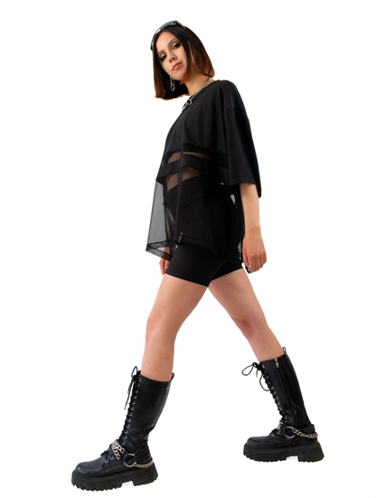 polera oversize malla y poliéster 84%